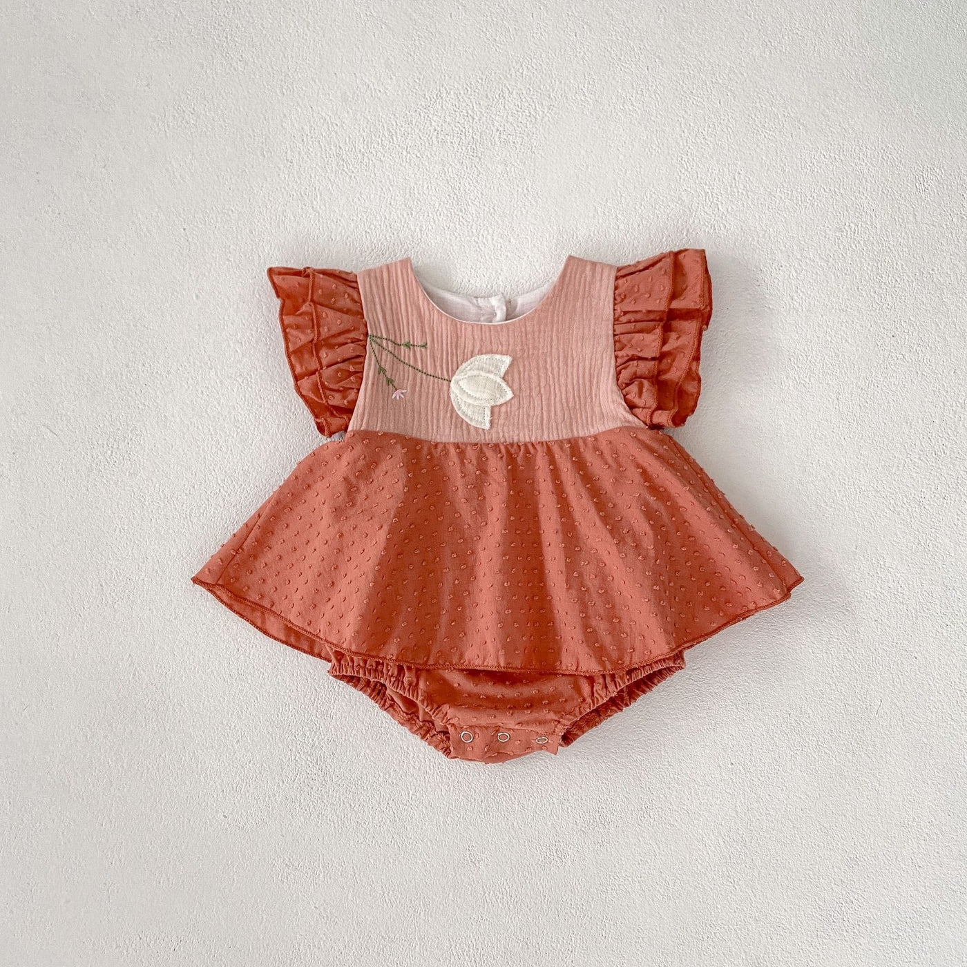 The Kids Summer Clothing Triangle Princess Dress is a stylish and comfortable romper for warm weather. With intricate embroidery and a trendy triangle design, this dress exudes a Korean princess vibe. The lightweight, breathable fabric keeps your child co