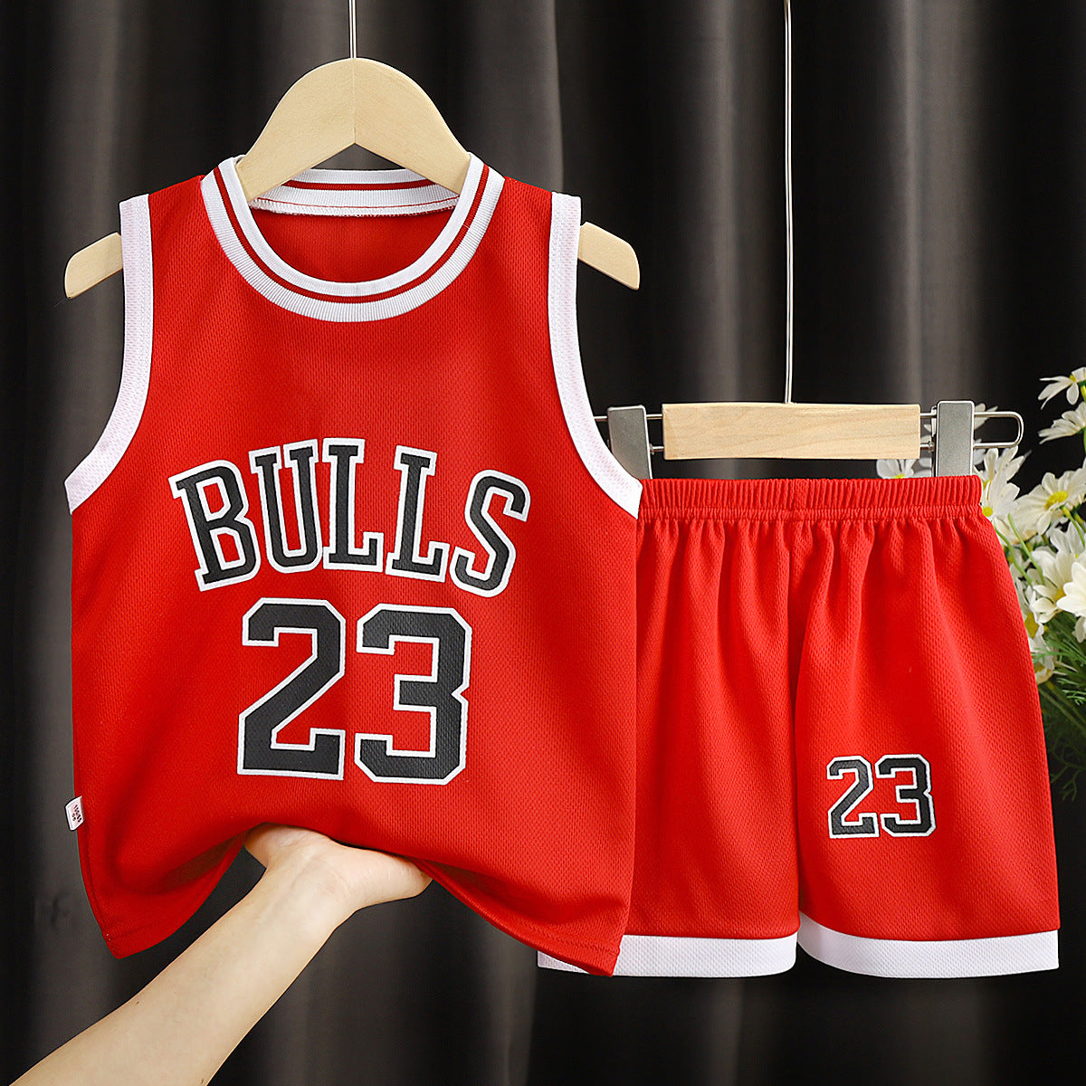 Let your child shine on and off the court with this Sports Basketball Wear Boys' Suit. Comfortable, durable, and stylish, it's perfect for active young athletes.