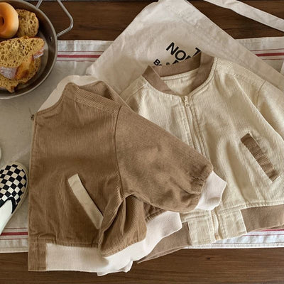The **Kids' Overcoat Spring Clothing** in **Japanese and Korean Corduroy** is the perfect blend of trendy design and comfort. Crafted from soft, breathable corduroy fabric, it’s ideal for layering during the milder spring months. This stylish overcoat off