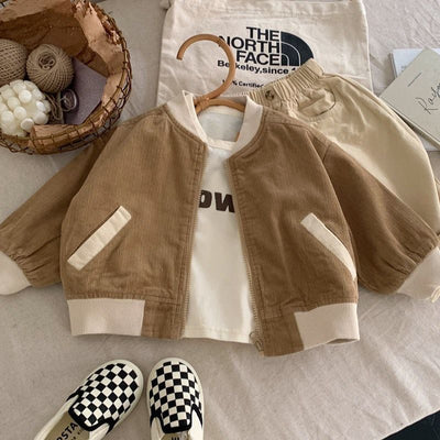 The **Kids' Overcoat Spring Clothing** in Japanese and Korean-inspired **Corduroy** offers a stylish, cozy, and comfortable look for your little ones. Made with soft, high-quality corduroy fabric, this overcoat provides warmth while remaining breathable f